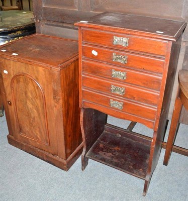 Lot 552 - A mahogany pot cupboard and a music stand