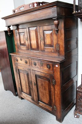 Lot 1111 - A Reproduction Joined Oak Court Cupboard, in...