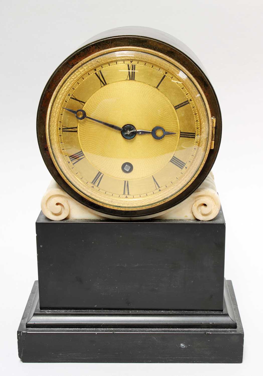 Lot 63 - A Black Slate Mantel Timepiece, 19th century,...