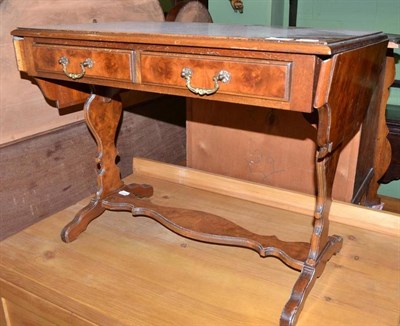 Lot 556 - Burr walnut sofa style occasional table