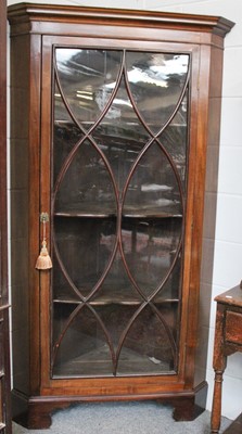 Lot 1247 - A Mahogany Freestanding Glazed Corner Cupboard,...