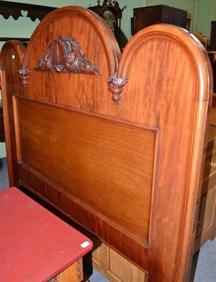 Lot 557 - A Victorian mahogany bed frame with carved shell motif