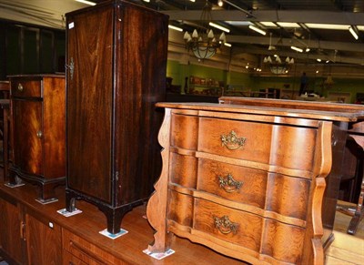 Lot 560 - A reproduction chest of drawers, a pot cupboard and a bedside table