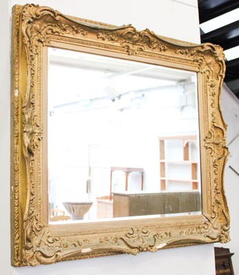 Lot 1311 - A Gilt Framed Wall Mirror, with bevelled...