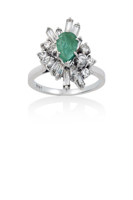 Lot 2116 - An Emerald and Diamond Cluster Ring the pear...