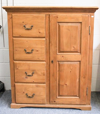 Lot 1336 - A Pine Compactum Wardrobe, with four drawers...