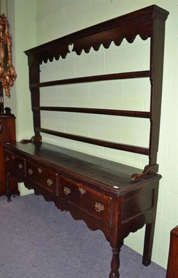 Lot 565 - A late 18th century oak open dresser with a later rack