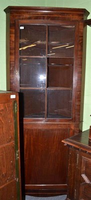 Lot 569 - Free standing Georgian mahogany corner cabinet