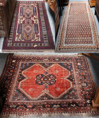 Lot 1089 - A Kurdish Rug, the charcoal field of stlyliced...