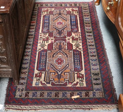 Lot 1089 - A Kurdish Rug, the charcoal field of stlyliced...