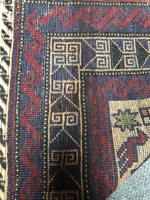 Lot 1089 - A Kurdish Rug, the charcoal field of stlyliced...