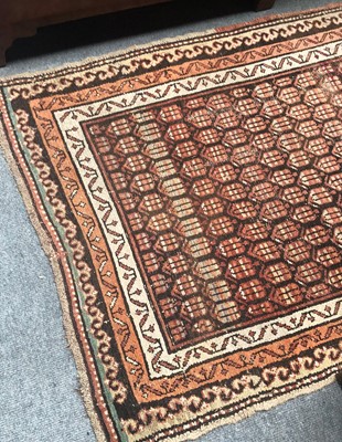 Lot 1089 - A Kurdish Rug, the charcoal field of stlyliced...