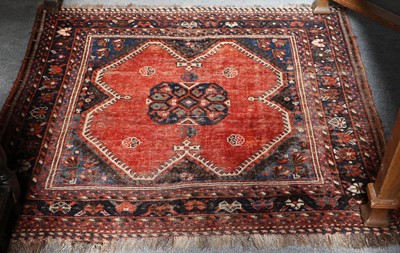 Lot 1089 - A Kurdish Rug, the charcoal field of stlyliced...