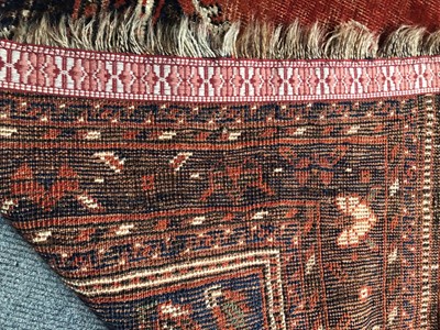 Lot 1089 - A Kurdish Rug, the charcoal field of stlyliced...