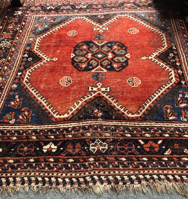 Lot 1089 - A Kurdish Rug, the charcoal field of stlyliced...