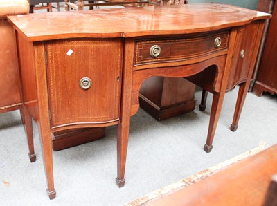 Lot 1167 - A 19th century Mahogany Serpentine Sideboard,...