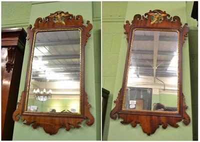 Lot 574 - Two mahogany Georgian fret cut mirrors