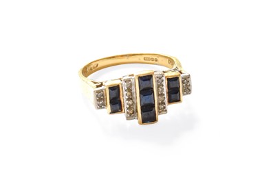 Lot 181 - An 18 carat Gold Synthetic Sapphire and...