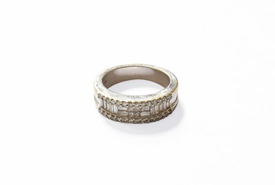 Lot 177 - An 18 Carat White Gold Diamond Half Hoop Ring,...