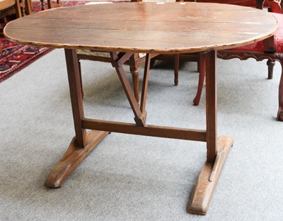 Lot 1160 - A 19th Century Oval Country Tip Top Table, on...