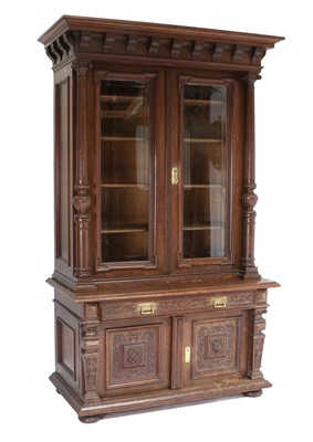 Lot 838 - A Victorian Carved Oak and Glazed Bookcase,...