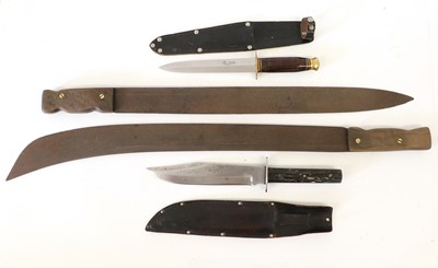 Lot 115 - A Bowie Knife, the 20cm clip-point steel blade...