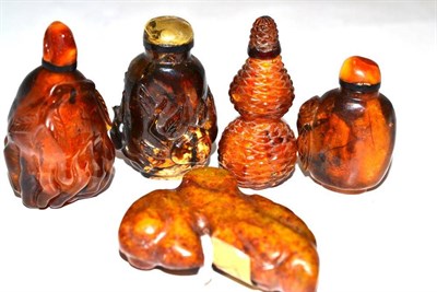 Lot 207 - A Chinese Amber Snuff Bottle and Stopper, in the form of a gourd carved with leaves, 6cm long;...