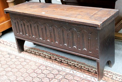 Lot 1145 - A Reproduction Carved Oak Six Plank Coffer,...