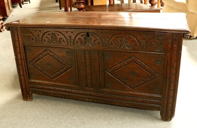 Lot 1197 - A 18th century Carved Oak Coffer, with two...