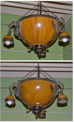 Lot 598 - A pair of Art Deco style ceiling lights with gilded metal mounts