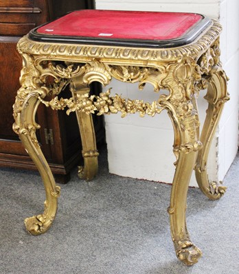 Lot 1371 - A Rococo Giltwood Stand, 19th century, with...