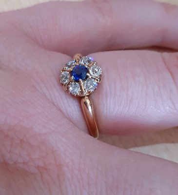 Lot 2060 - An 18 Carat Gold Sapphire and Diamond Cluster...