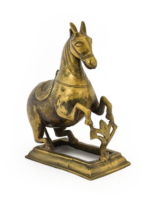 Lot 143 - A Mughal Brass Rearing Horse, probably...