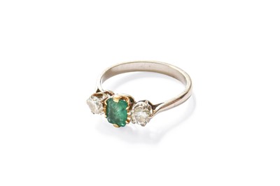 Lot 146 - An Emerald and Diamond Three Stone Ring, the...