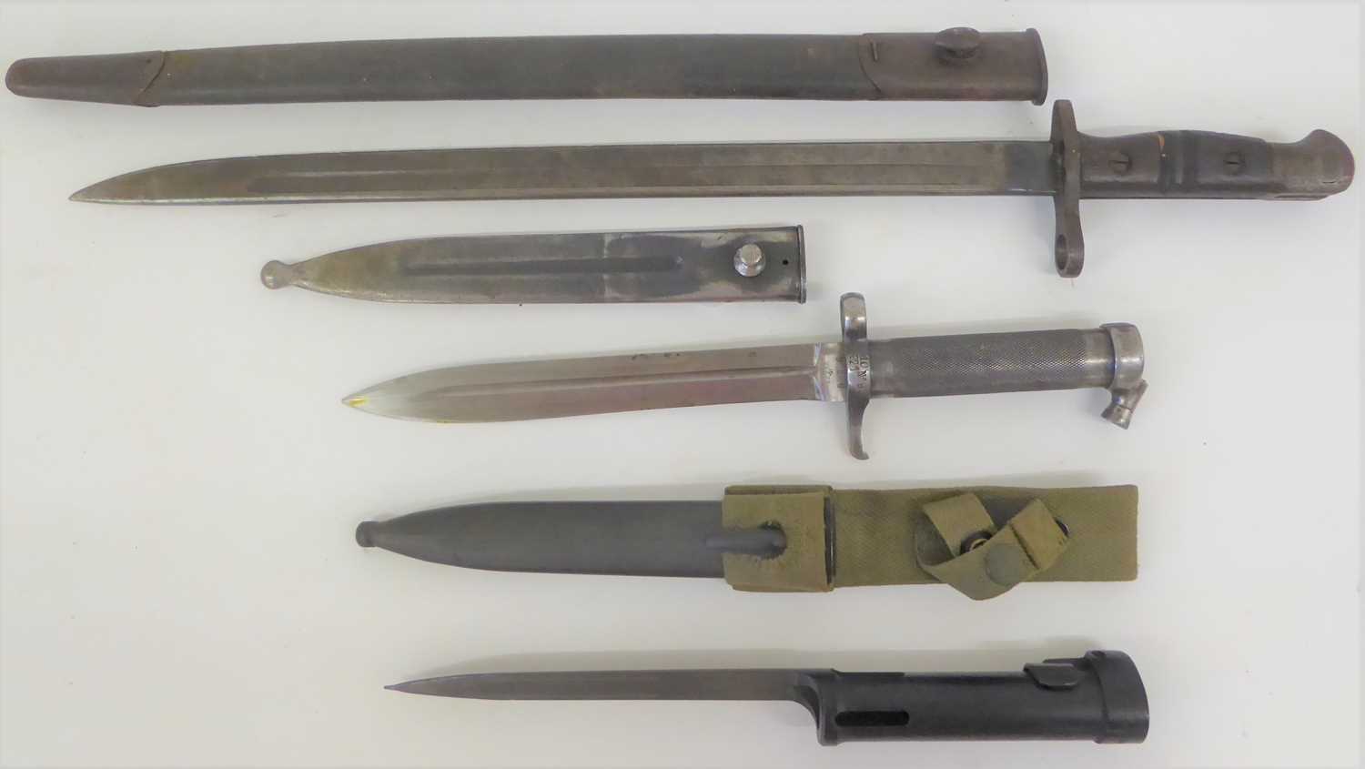 Lot 211 - A Remington 1913 Pattern Bayonet, the blade...