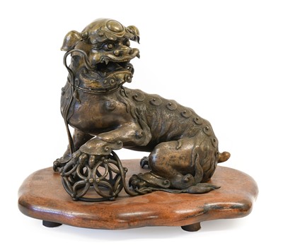 Lot 130 - A Chinese Bronze Dog of Fo, Qing Dynasty, cast...