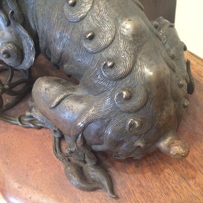 Lot 130 - A Chinese Bronze Dog of Fo, Qing Dynasty, cast...