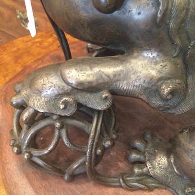 Lot 130 - A Chinese Bronze Dog of Fo, Qing Dynasty, cast...