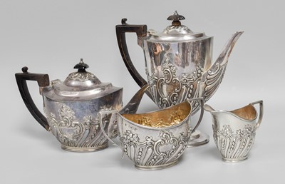 Lot 58 - A Four-Piece Victorian and Edward VII Silver...