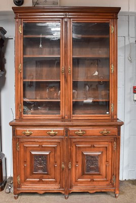 Lot 1257 - A Late Victorian Walnut Library Bookcase,...