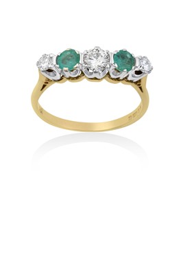 Lot 2117 - An 18 Carat Gold Emerald and Diamond Five...