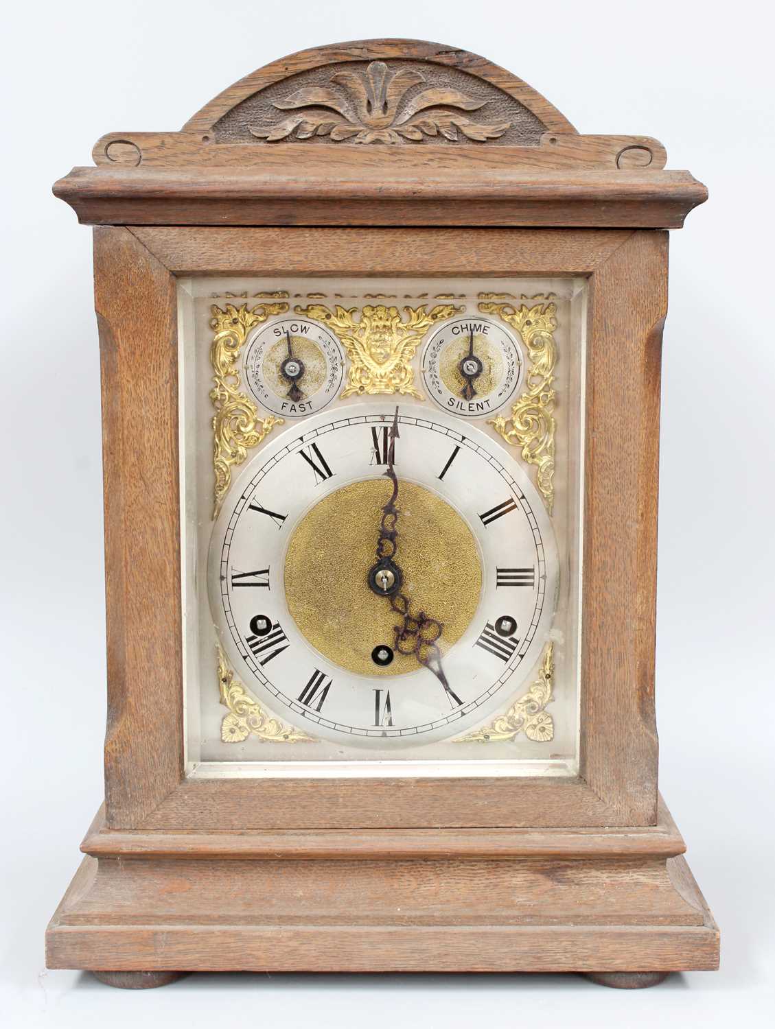 Lot 1261 A German Oak Chiming Table Clock, circa