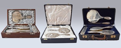 Lot 91 - Three Cased Silver-Mounted Dressing-Table...