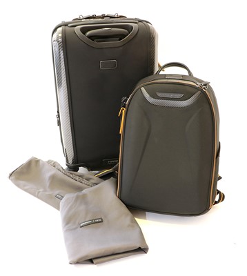 Lot 615 - Tumi Luggage: A McLaren Suitcase, with dust...