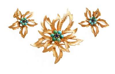 Lot 1028 - A Synthetic Sapphire and Turquoise Floral...