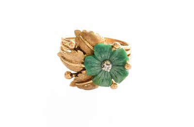 Lot 1032 - A Diamond and Green Hardstone Floral Ring,...