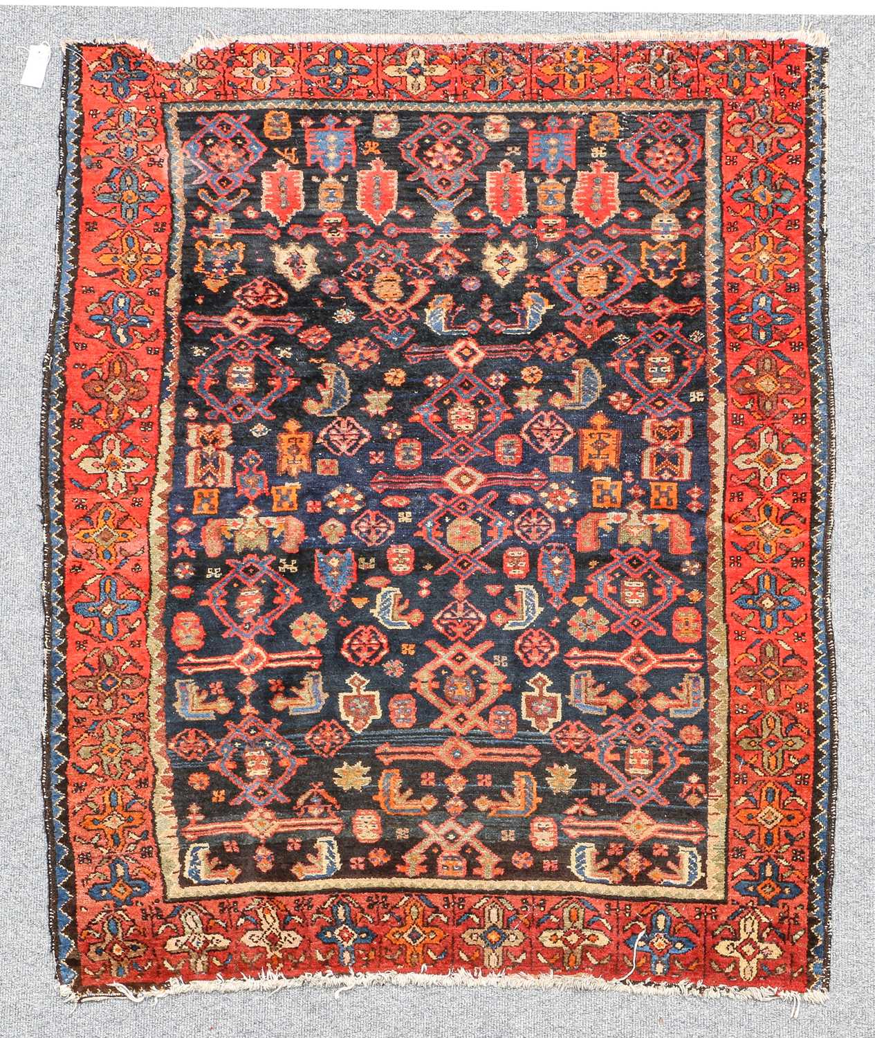 Lot 310 - Heriz Rug North West Iran, circa 1930 The deep...