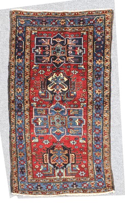 Lot 310 - Heriz Rug North West Iran, circa 1930 The deep...