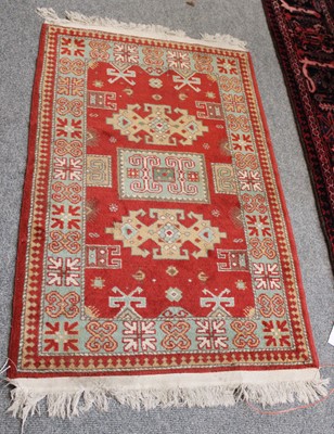 Lot 1026 - Baluch Rug, the autumnal field of cruciform...