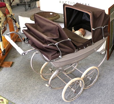 Lot 1340 - A Silver Cross Pram